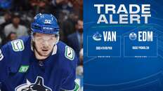 Edmonton Oilers trade for big, aggressive Vancouver forward. What does it mean?