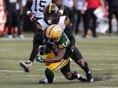 Mitchell helps Tiger-Cats blitz winless Elks 44-28