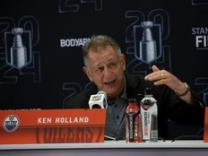 Former Oilers GM Holland joins playoff rivals Los Angeles Kings