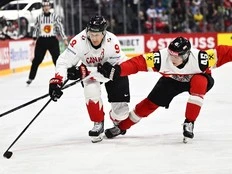 MacKinnon has two goals, assist as Canada beats Austria 5-1 at hockey worlds