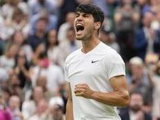 Alcaraz holds off Humbert in 4 sets to reach Wimbledon quarterfinals