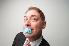 SUCKERS UNITE: Stressed-out folks soothing with adult pacifiers
