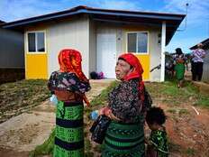 Panama community pushed from island by rising sea levels moves into new houses