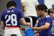 Japan's World Cup fans praised for cleaning up garbage after match