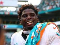 Cop placed on leave after Dolphins' Tyreek Hill handcuffed for traffic violation ahead of season opener