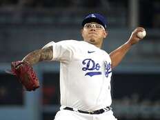 Pitcher Julio Urias suspended through All-Star break under domestic violence policy