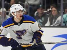 St. Louis Blues’ Dylan Holloway escapes serious injury after being struck in neck by puck