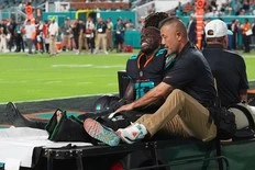 Dolphins’ Tyreek Hill carted off field and taken to hospital with serious left leg injury