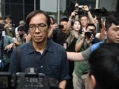 A Hong Kong court convicts 2 journalists in a landmark sedition case