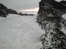 Unusual weather interrupts summer and drops snow in mountains along West Coast