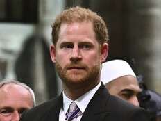 Prince Harry settles a case against a UK tabloid publisher that hacked his phone