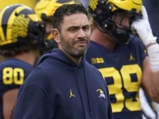 Thousands of intimate images found in hacking investigation of former NFL and Michigan coach
