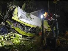 At least 16 dead and 12 injured as passenger bus falls off ravine in central Philippines