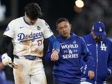 Shohei Ohtani partially dislocates left shoulder during World Series Game 2, status TBD