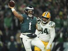 Hurts tosses 2 TD passes to lead Eagles past Packers in NFC wild card clash