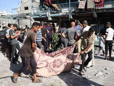 Israeli airstrikes hit UN school and homes in Gaza, killing at least 34 people, hospitals say