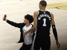 Selfie-seeking fan banned for life by NBA after crashing Finals game