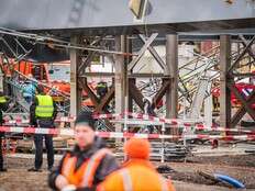 2 workers die after part of a bridge being built over a Dutch canal collapses