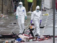 Man accused of ramming car into Liverpool soccer parade pleads not guilty to 31 charges