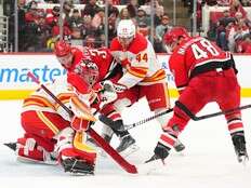 Three takeaways as Flames salvage a point but fall to Hurricanes to OT