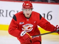 ‘It’s a remarkable story’: How Flames prospect Aydar Suniev realized his NHL dream