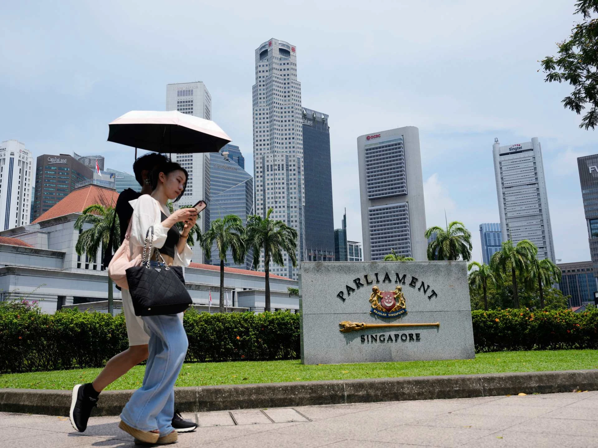 Singapore votes as city-state prepares to mark 60 years of independence