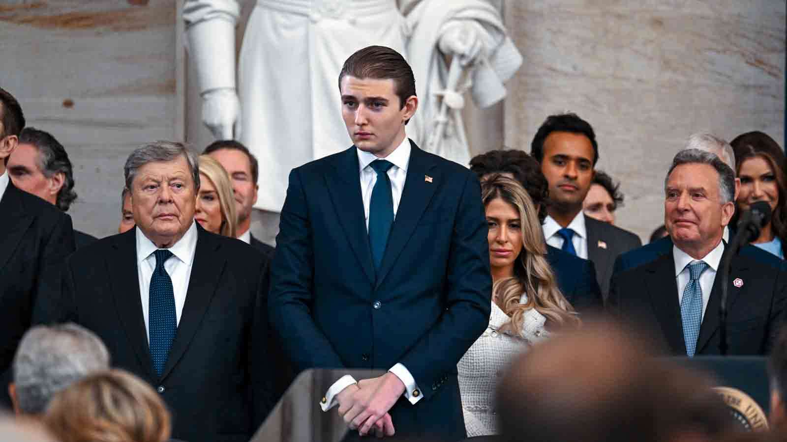 How tall is Barron Trump? President's youngest son towers over inauguration crowd