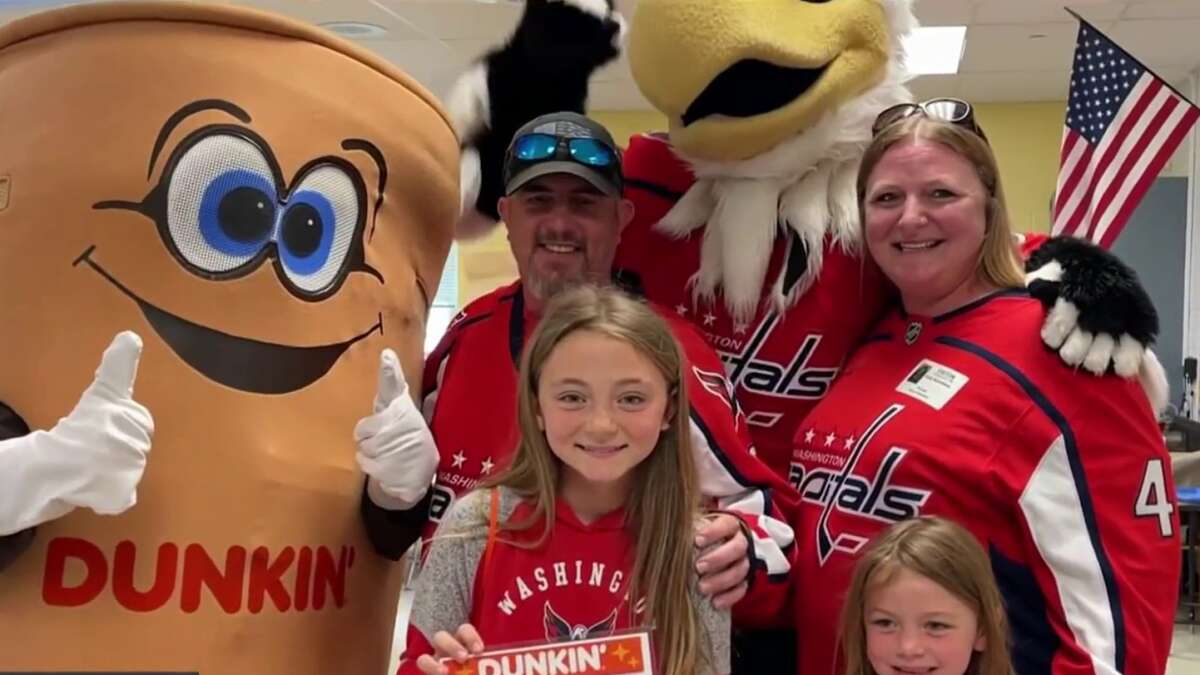 Dad and daughter who ‘missed the bus' to go to Caps open practice surprised with playoff tickets