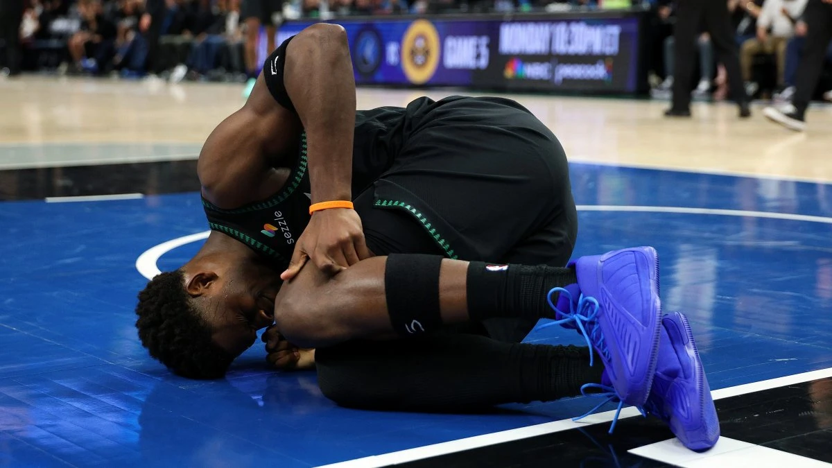 Wolves' Anthony Edwards likely to miss weeks with knee injury, source says