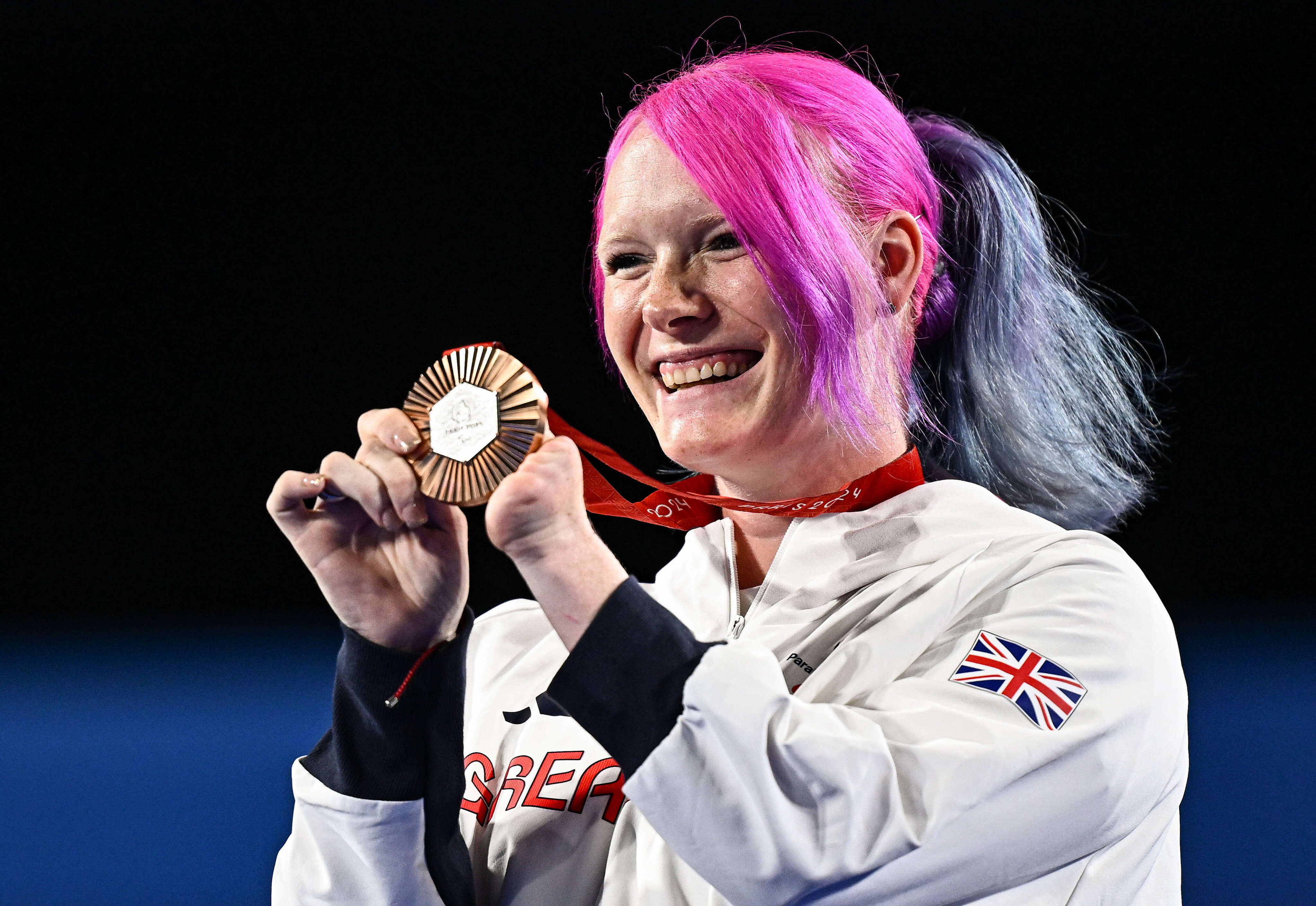 Para archer Jodie Grinham becomes 1st athlete to win Paralympics medal while pregnant