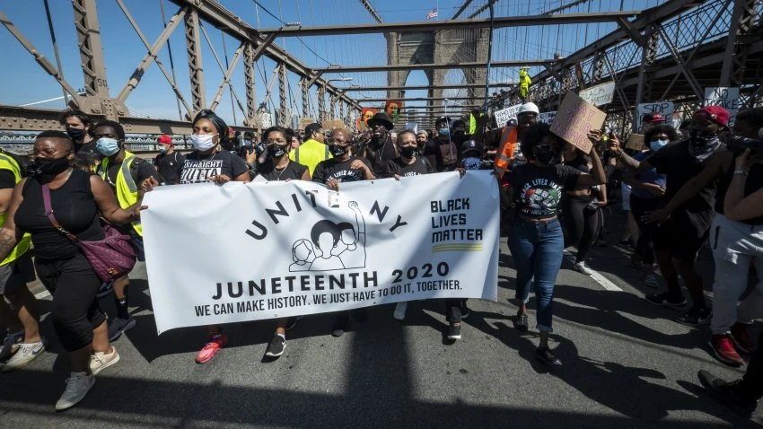 Black Americans Laud Juneteenth Holiday, Say More Work Ahead