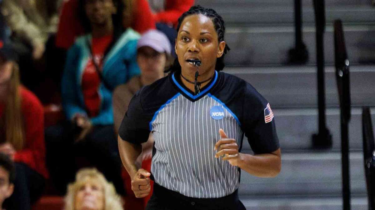 NCAA removes game official at halftime because of background conflict