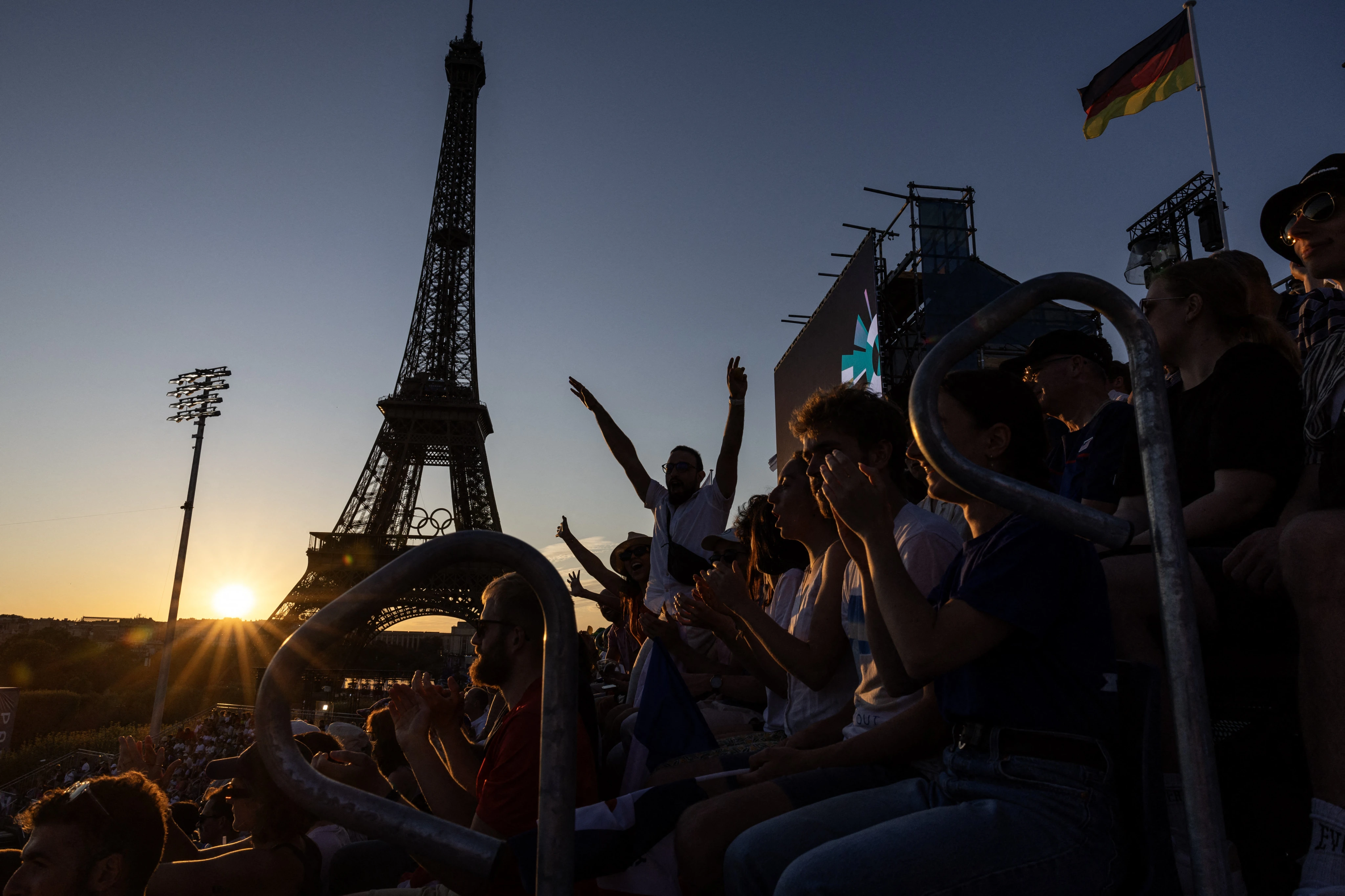 Beach volleyball at Eiffel Tower stadium draws the crowds looking for the perfect social media post