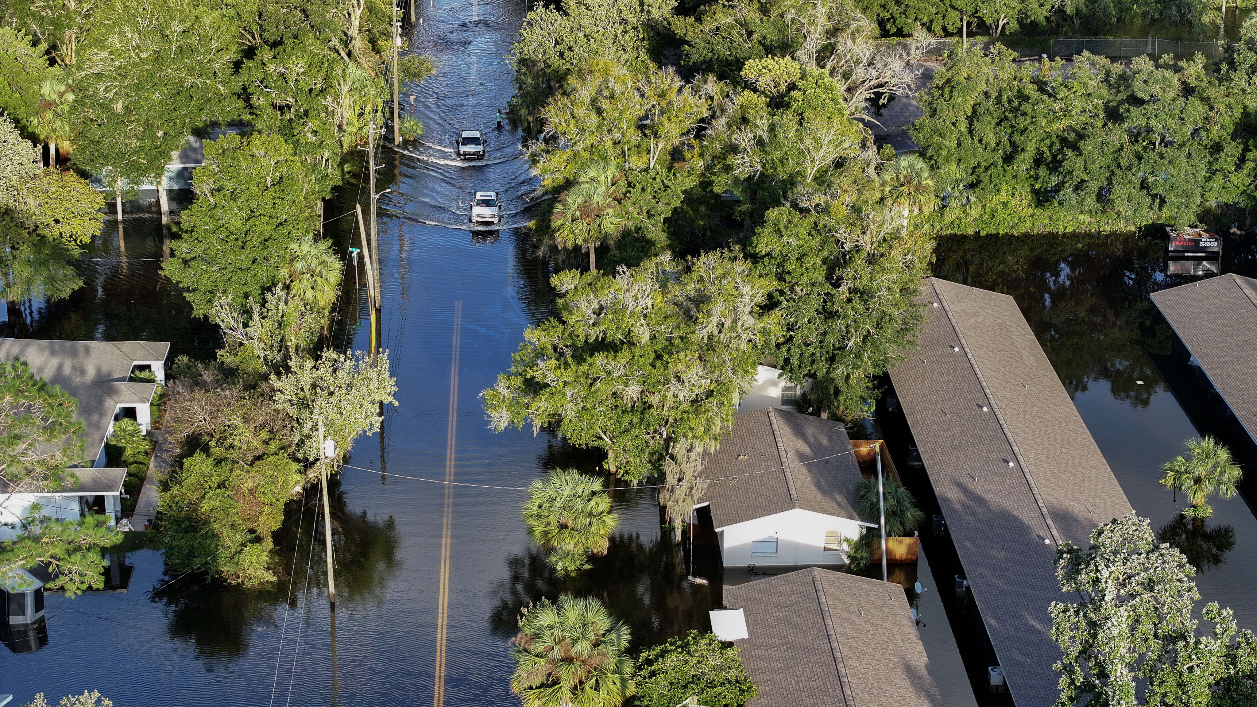 After destructive hurricanes pummel Florida, Senate candidates' climate-change policies come under scrutiny