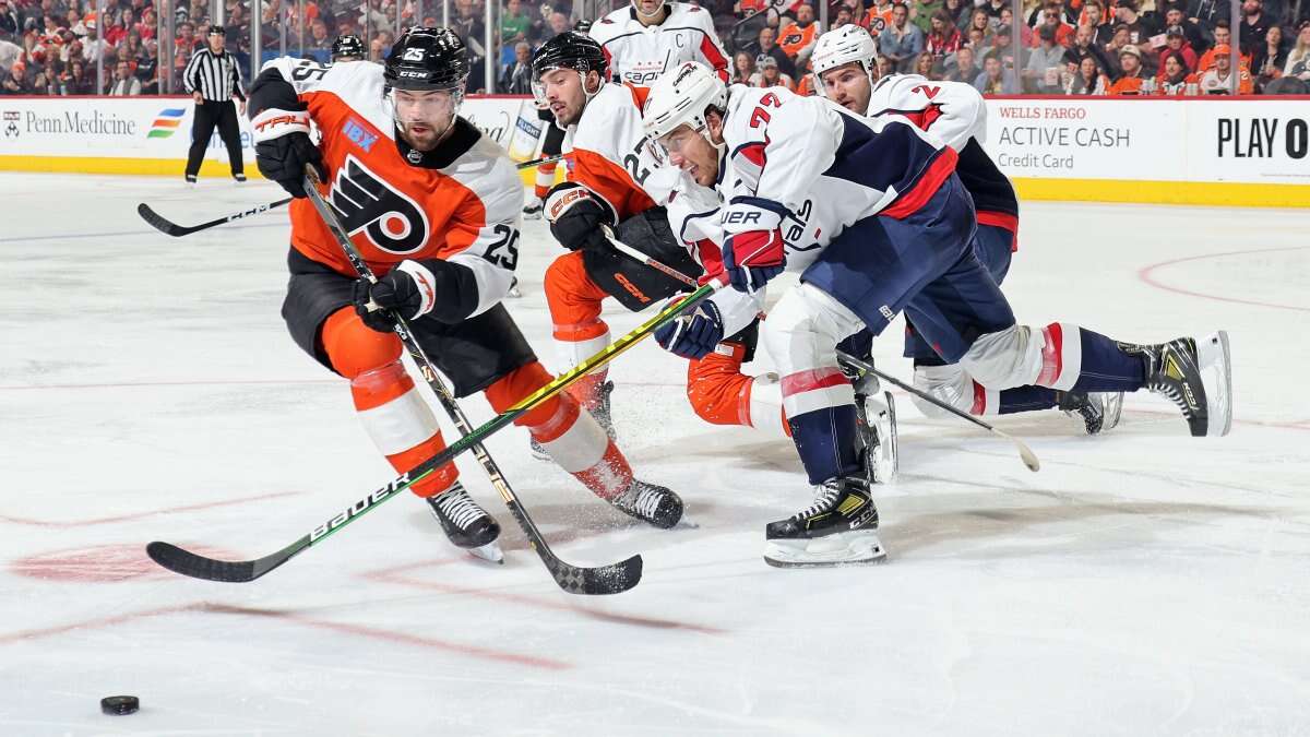 Oshie scores game-winner into empty net as Capitals make playoffs by beating Flyers