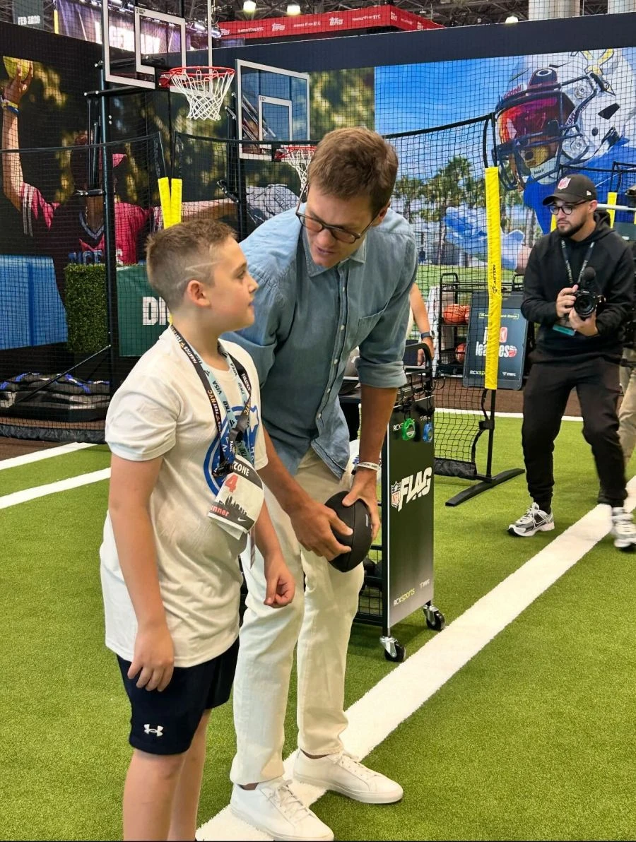 Wish granted! Make-A-Wish teen has a catch with Tom Brady at Fanatics Fest