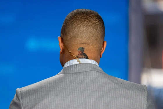 See Craig Melvin get a tattoo of Savannah Guthrie's face after losing NFL bet