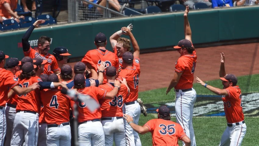 Michaels, Abbott Help Virginia Beat Tennessee in CWS Opener