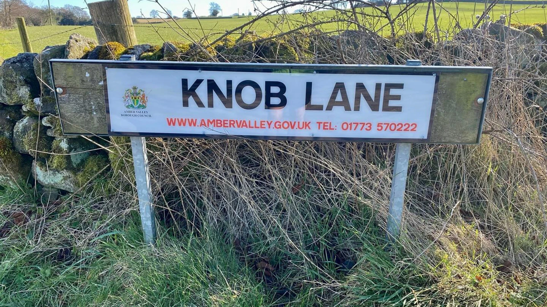 We live on Knob Lane - people pose next to sign but same thing always happens