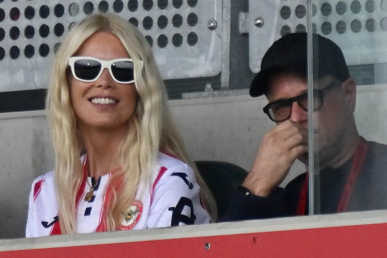Ex-world's sexiest woman spotted at Brentford in kit after husband invested