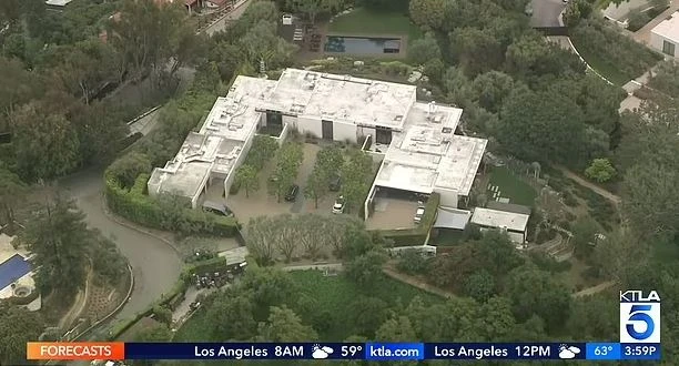 Intruder rams car through gates of Jennifer Aniston's pad while she's home