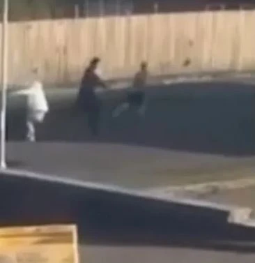 Moment woman is battered with golf club in terrifying daylight 'SWORD FIGHT'