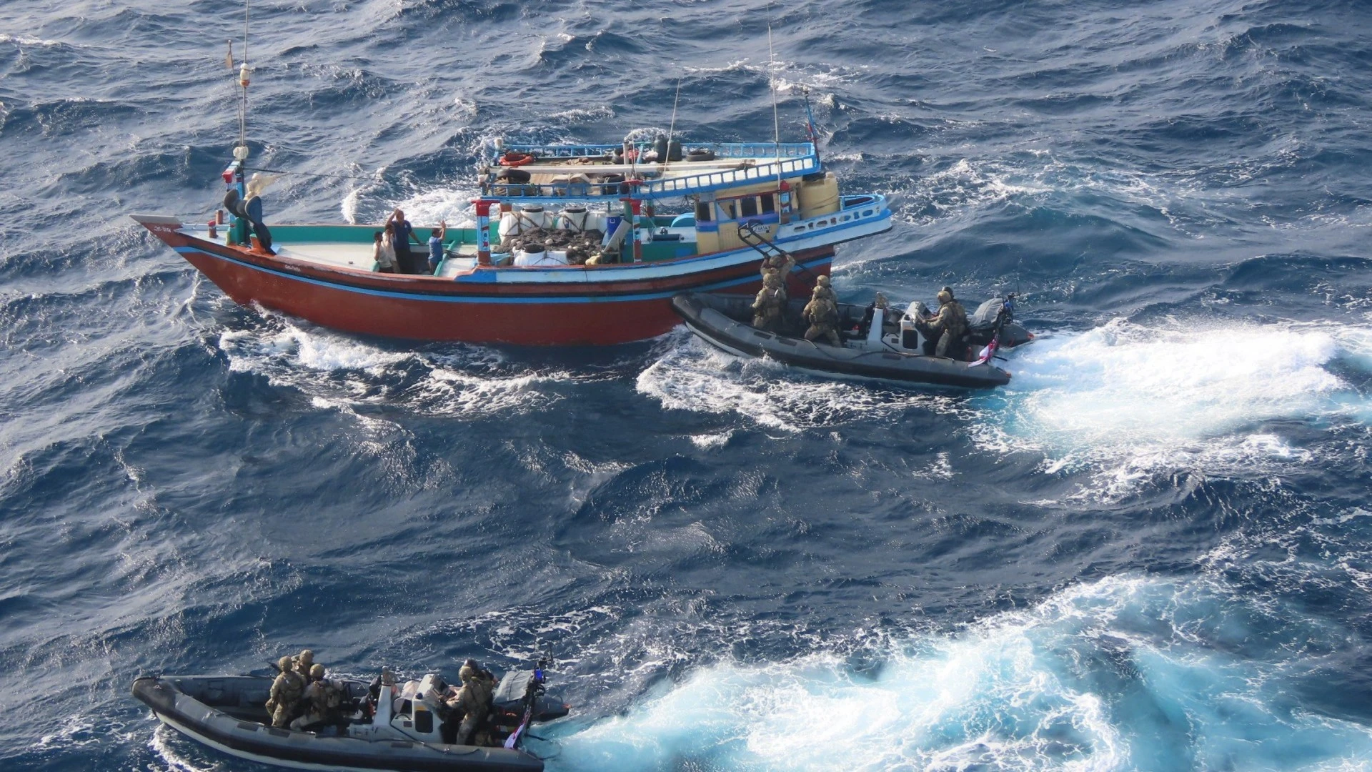 Marines pose with £30m worth of drugs after storming smuggler’s dhow