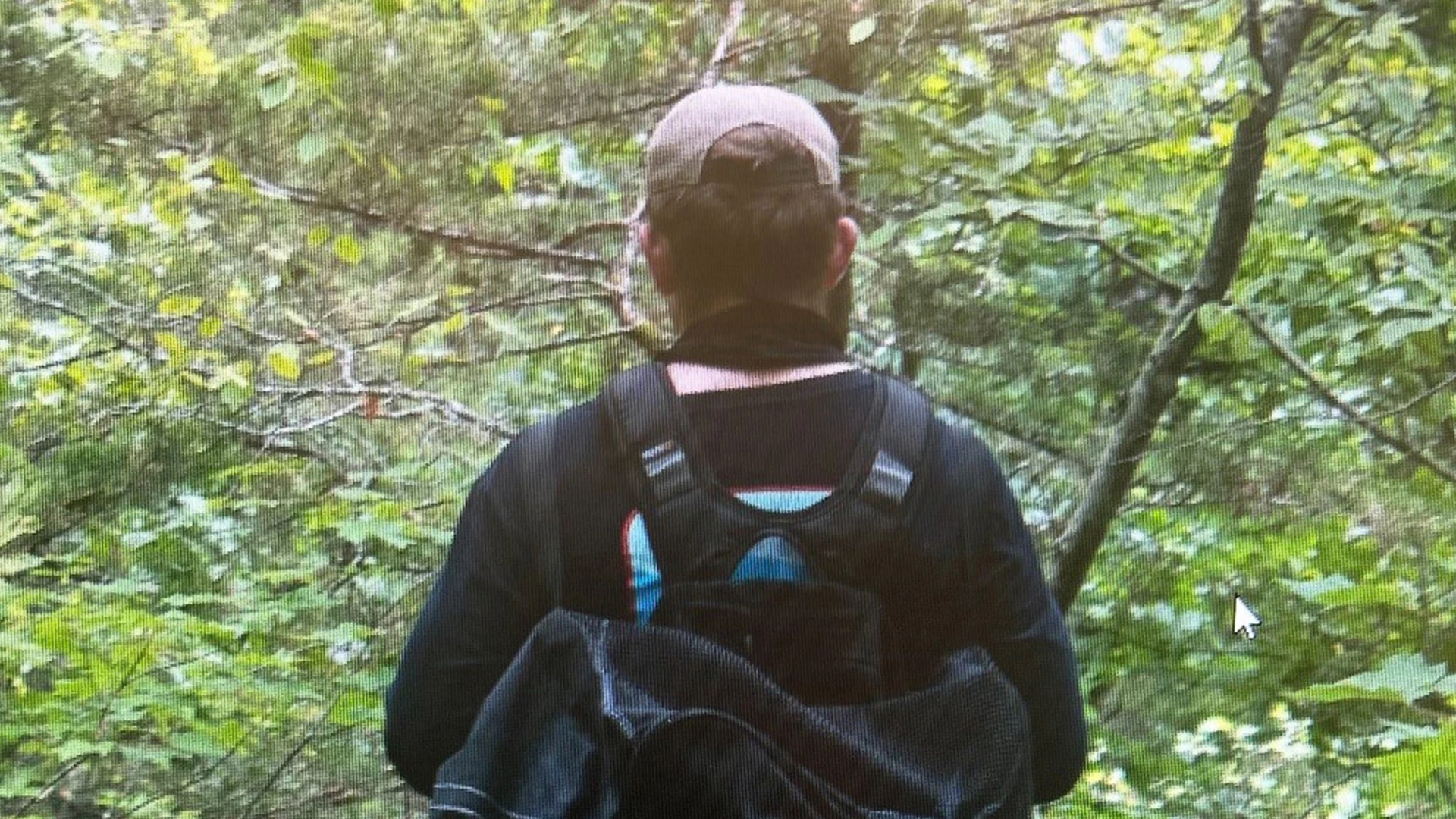 Eerie new pics of man wanted for questioning in murder of parents who saved girls