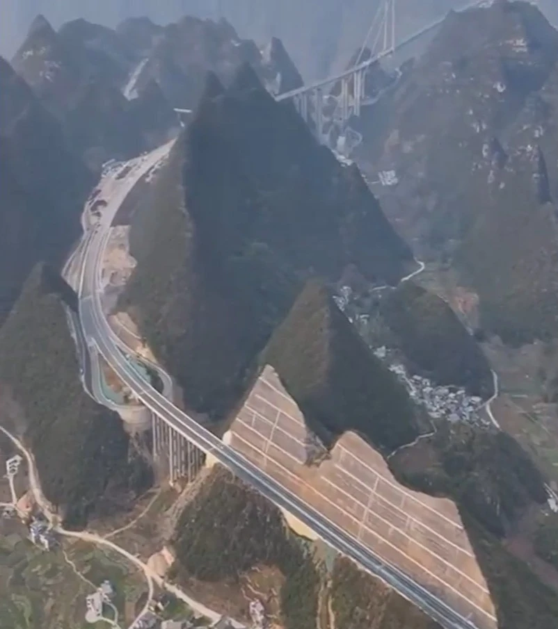 Moment mountain is cut IN HALF to build highway & world's highest bridge