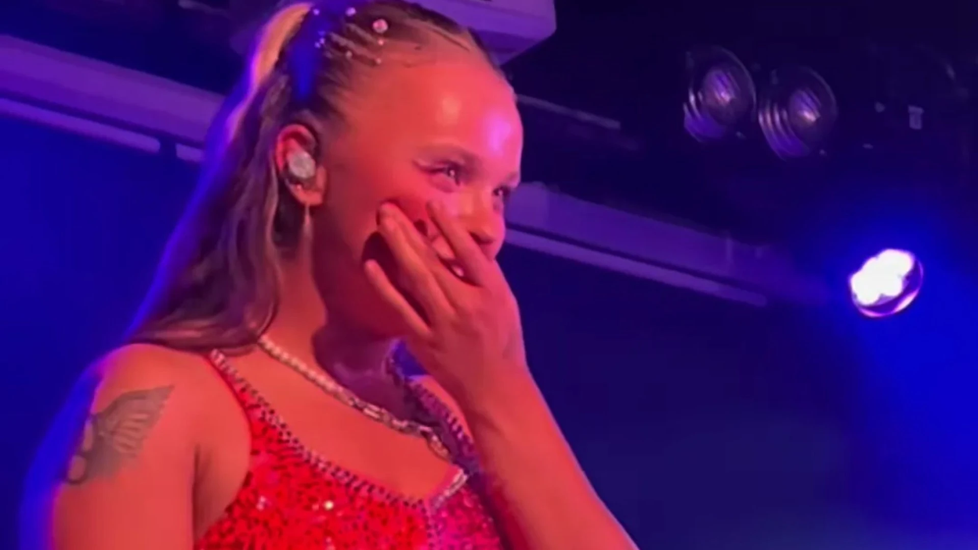 JoJo makes Chris Hughes blush with cute tribute as he watches her perform