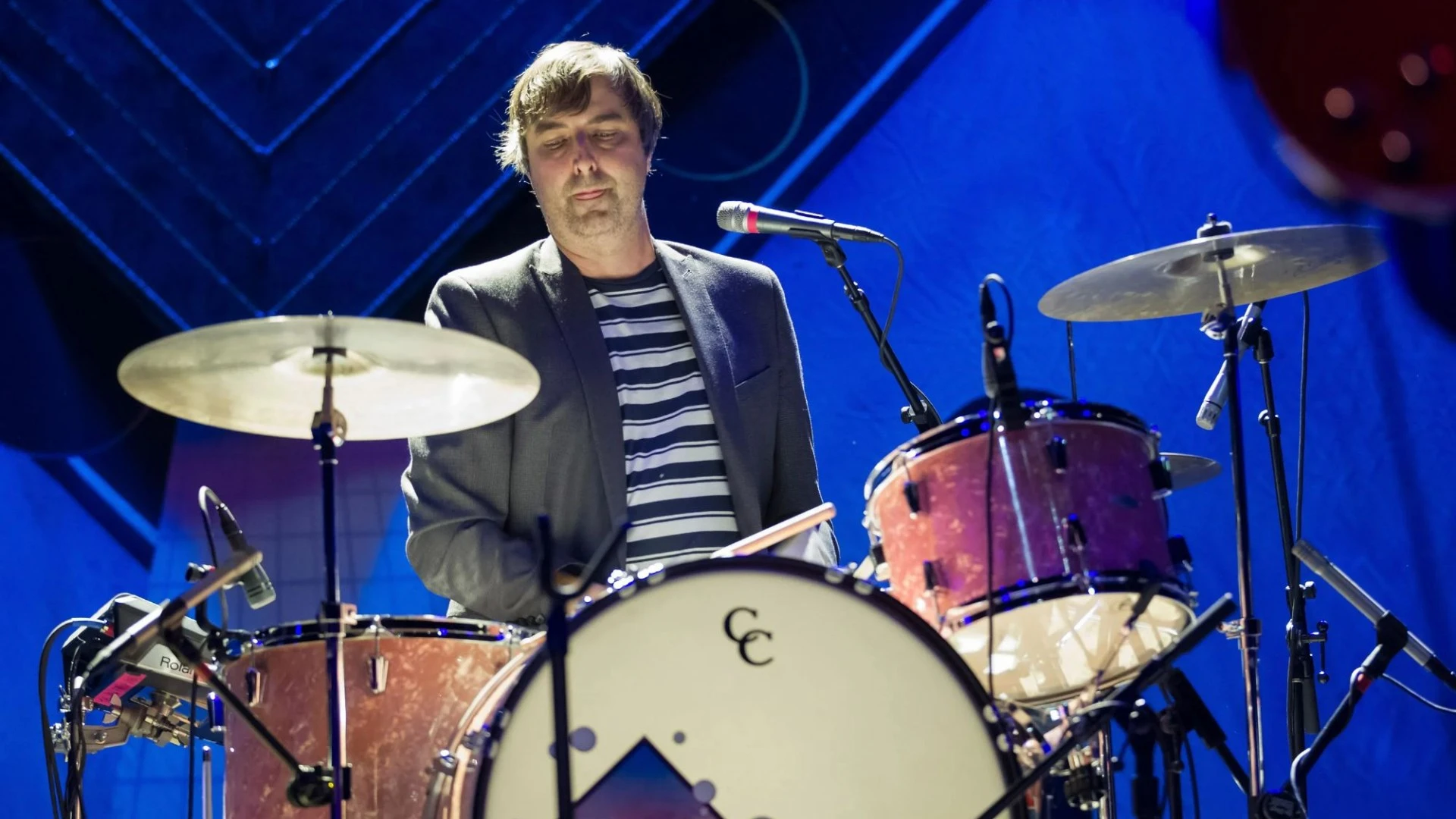 Rock drummer charged over child sex abuse pics 'after filming boys in toilet'