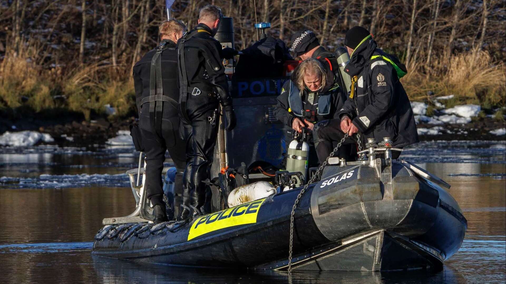 Dogs & divers trawl icy river for missing twins, 32, last seen 6 days ago