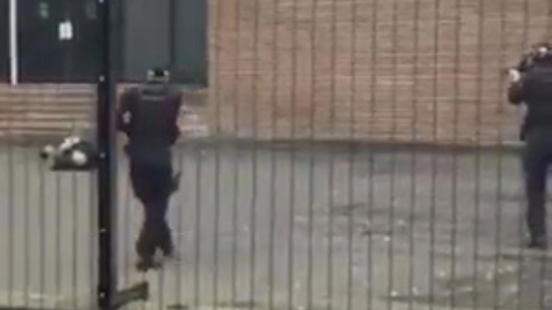 Moment bystanders yell 'he's got a bomb!' as cops shoot 'terrorist' knifeman