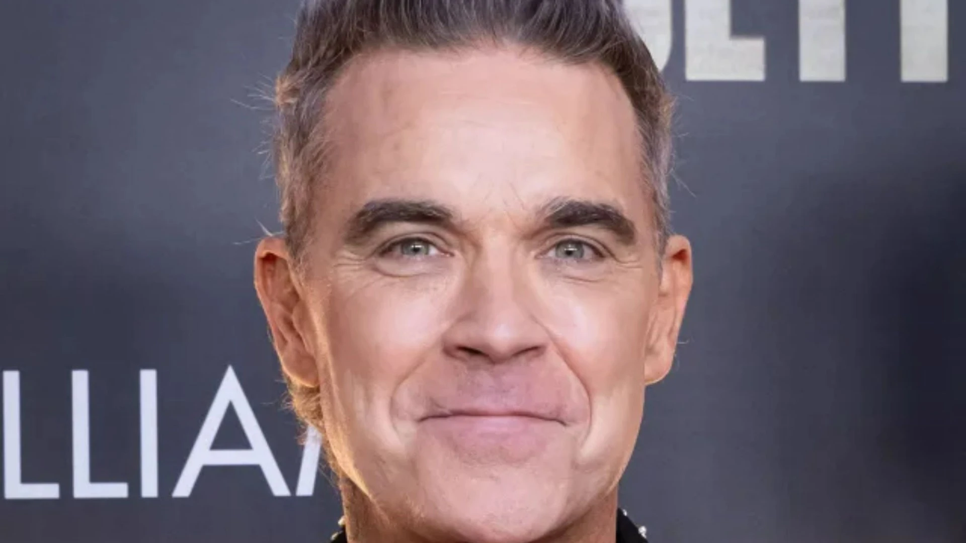 Robbie Williams reveals he's developed Tourette's & is scared to perform live